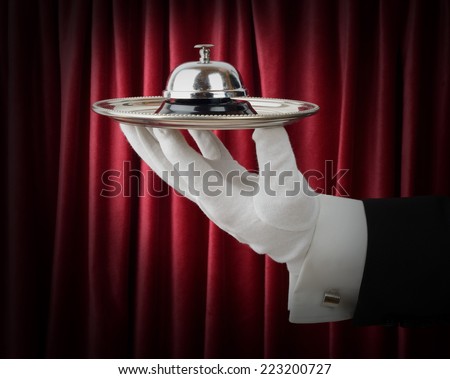 Concept of a waiter or butler offering a service