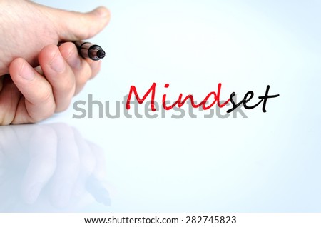 Pen in the hand isolated over white background Mindset