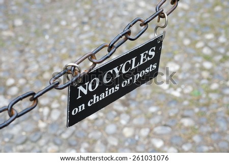 No Cycles Sign with chain