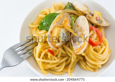 spicy spaghetti clams on the white  table