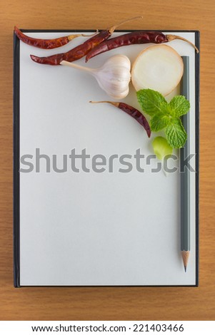 notebook paper on wood plank texture background