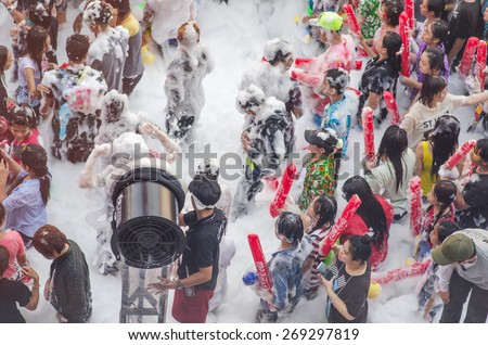 BANGKOK, THAILAND - 14 APRIL 2015 : Foam party. Tourists come to Thailand and splatter water to each other. 
