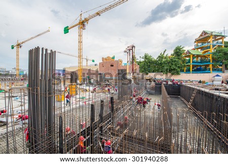 Nakhon Ratchasima, Thailand - June 9, 2015 : Pouring the concrete foundation of the building. June 9, 2015 in Nakhon Ratchasima, Thailand