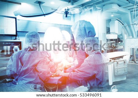 Double exposure of Skillful doctors are operating on a patient. Team of surgeon in uniform perform operation on a patient, healthcare and science concept