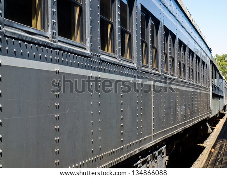 Closeup Side View of an Old-Fashioned Passenger Train