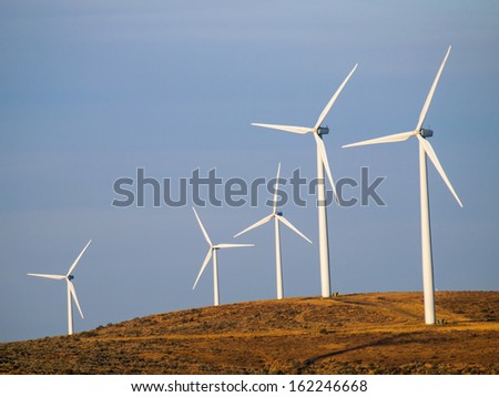 A Windmill Farm on a Mountain at Dusk