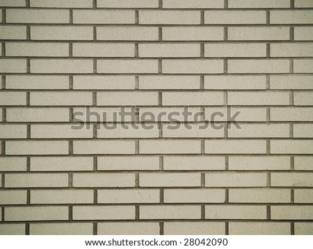 Brick wall background, in good repair, in shades of white.