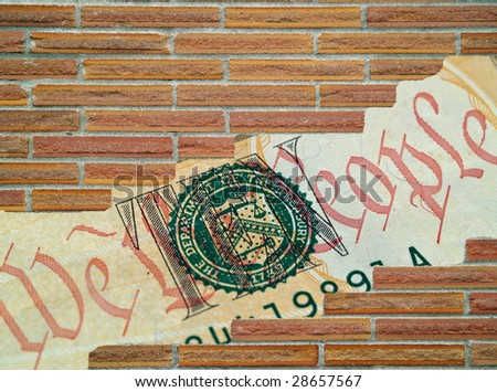 Brick wall background, with large hole showing detail from the US ten dollar bill - \