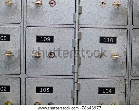 Old Gray and Numbered Safety Deposit Boxes