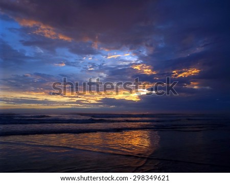 Colorful, Cloudy Sunset at the Ocean\'s Shore