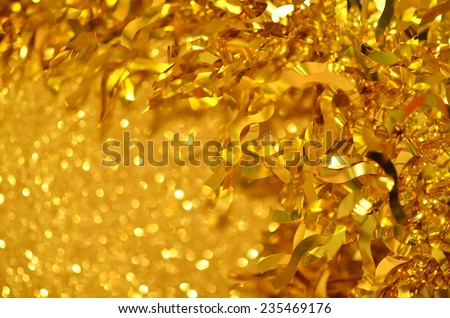 Striking golden ribbons for Christmas & Chinese New Year decorations / Christmas & Chinese New Year celebrations / golden backgrounds