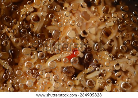 Refrigerated food with water droplets condensation after being removed from fridge / Abstract background / Pre-cooked food chilled for later serving, good for busy couples