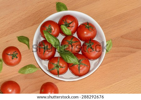 The tomato plant is widely cultivated worldwide, popular as a fruit and also as a culinary ingredient  / Grape tomatoes / Tomatoes are eaten raw, cooked or as a drink for both old and young