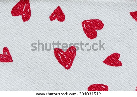 Red heart prints on canvas background / Abstract background / Promotions on children curriculum and activities
