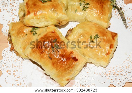 Home baked mini beef puffs in bite size, consisting ground beef, ready made pastry / Mini puffs / Easy to make, simple to prepare, all ingredients are found around the house