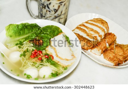 A hearty meal of teowchew fishball noodle for light eater during breakfast or lunch / Fishball noodle / Made exclusively from fish paste and moulded into fishballs or fishcakes, healthy living