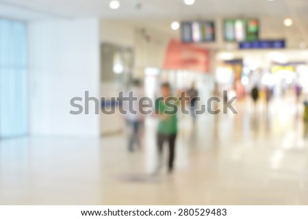 Blurred background : Clean the floor at airport terminal blur background with bokeh light