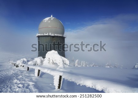 Ice-covered screen weather station, high on mountain-top, Germany