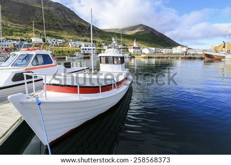 Akureyri harbor. Motorboats, yachts and small fishing ships.  All brand names and registration numbers removed.