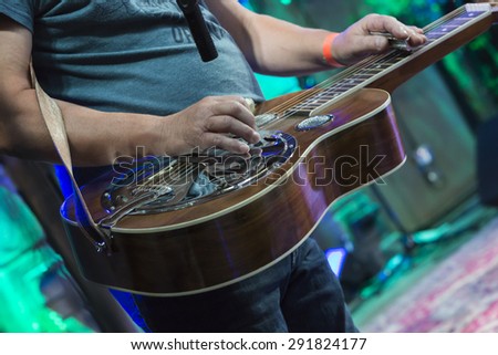 Classic Dobro guitar played my a master on concert.