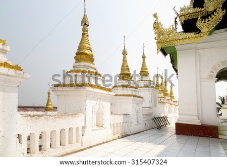 White pagoda is on Sagaing Hill, Myamar. On the top floor of temple.