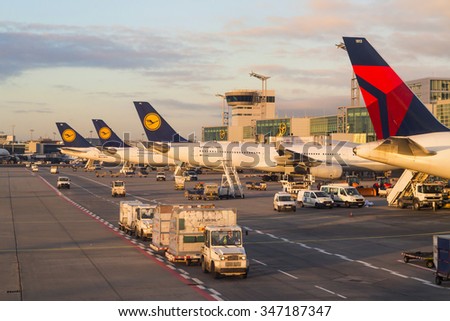 FRANKFURT, GERMANY  - NOVEMBER 8th 2014: Empty Lufthansa aircraft standing on the handling ramp at Frankfurt at sunset time