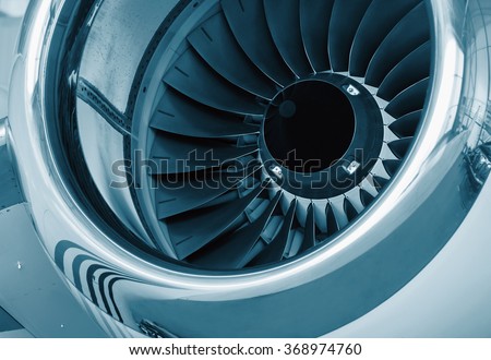 detailed insigh tturbine blades of an aircraft jet engine, colored technical blue
