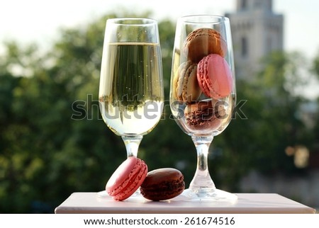 Two glasses of French macarons and white wine/Two glasses of French macarons and white wine