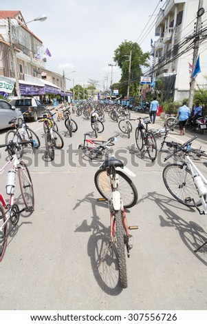 UTHAI THANI,THAILAND-AUGUST 16,2015 : Unidentified Cyclist and people in \