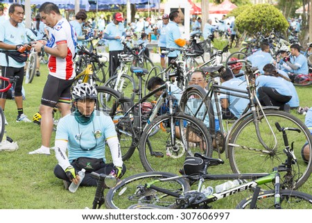 UTHAI THANI, THAILAND-AUGUST 16,2015 : Unidentified Cyclist and people in \