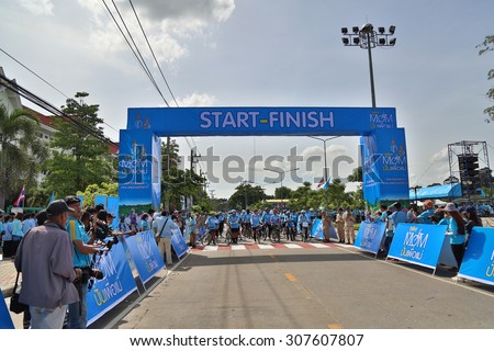UTHAI THANI, THAILAND-AUGUST 16,2015 : Unidentified Cyclist and people in \
