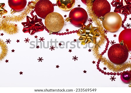 Christmas background with red and gold balls, stars and snowflakes, Isolated over white.