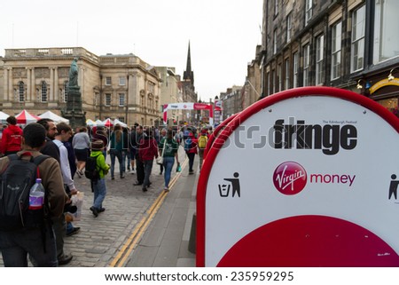 EDINBURGH, SCOTLAND: AUGUST 20, 2014: Fringe festival banner at Royal mile. One the most popular festivals in the world