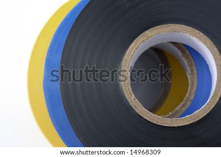Electricians electrical insulation tape, yellow,black and blue isolated on a white background