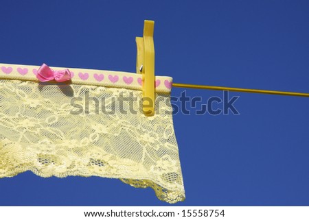 Clothes on washing laundry line blue skies