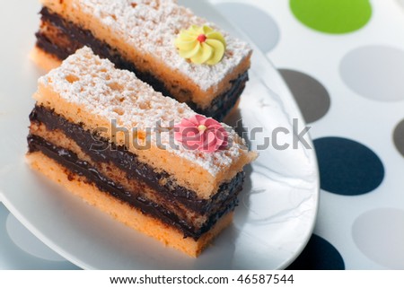Sponge cakes bricks double filled with neapolitan sanguinaccio chocolate sauce