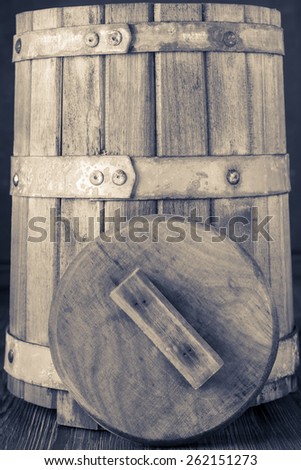 The old tub / barrel for wine or pickles background. color toning