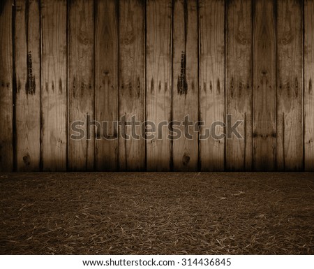 weathered barn wood background with knots. old wood. grass floor. sepia