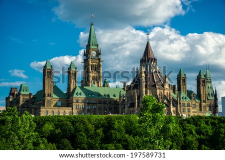Image of Canada\'s Parliament Hill and Parliament Buildings, the seat of the federal government of Canada, taken from the back side of the buildings.