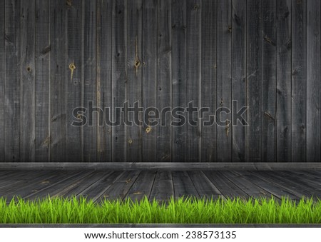 Interior. Grunge dark wood wall and floor with green grass, background texture.