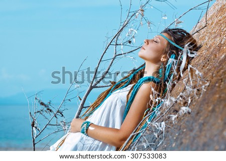 sensual portrait of young caucasian woman with eyes shut.