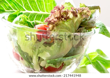 close up glass bowl of vegetable salad