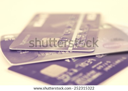 close up stacking credit cards , selective focus by very shallow focus