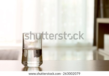closeup Glass of water on table in the living room