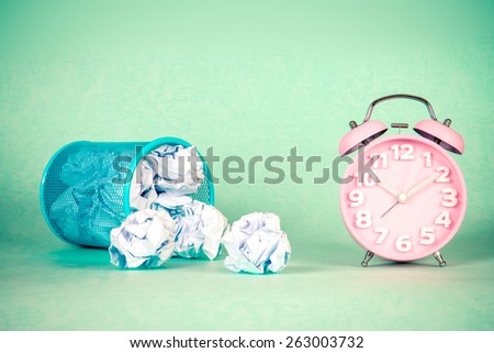 retro and vintage style of Old fashioned the alarm clock and crumpled paper waste  idea