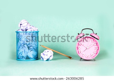 retro and vintage style of Old fashioned the alarm clock and clumpled peper waste  idea
