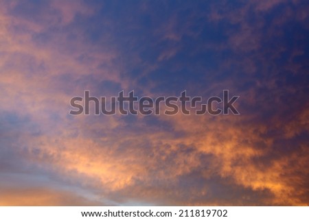 Sky with pink clouds at sunrise