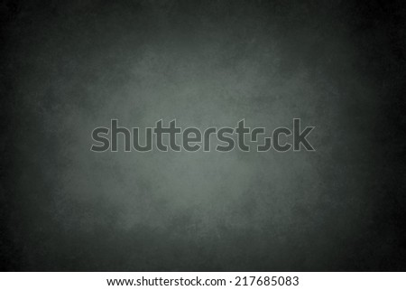 dark abstract texture or background with black vignette borders