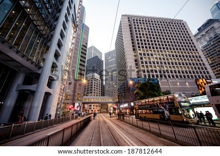 HONG KONG, CHINA - DECEMBER 21, 2013: City train rails and traffic on Hong Kong Island on December 21, 2013 in Hong Kong, China.