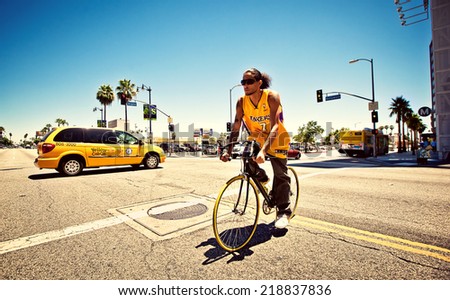 SANTA MONICA, USA - JULY 24, 2011: Man riding bike on July 24, 2011, USA Santa Monica, CA, USA